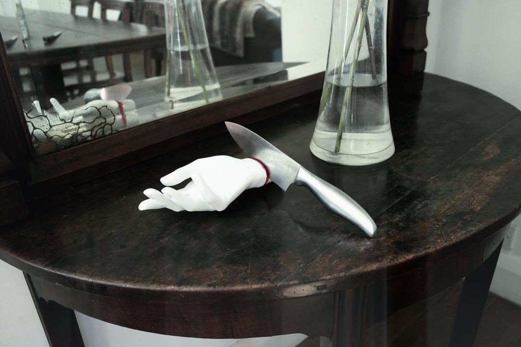 Slit - hand shaped knife sharpener